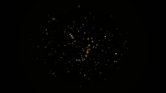 Golden glitter particles floating on black background