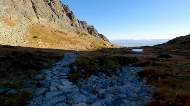 Action POV Hyperlapse Hiking Along Rocky Alpine Mountain Trail