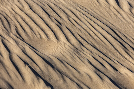 View of the intricate ripple patterns on the sand dunes at Rubjerg Knude in Lokken, Jutland, Denmark.