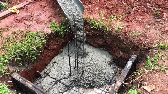 Mixing together to make a strong concrete floor, Mixing concrete concept, Slow motion