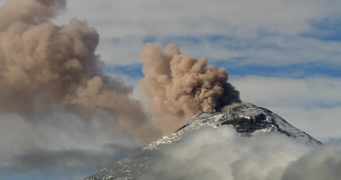 Cotopaxi Volcano, Ecuador, erupting, 12th of May 2023,. Volcanic ash is erupting from the crater. At 5897m altitude one of the world's highest active volcanoes.