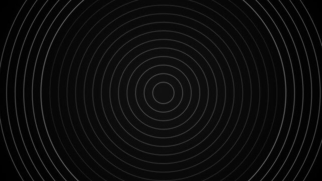 Abstract black background with concentric circular lines pattern