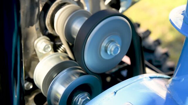 Operation of an engine with a belt drive to pulleys and gears. Repair and replacement of belt drive components.