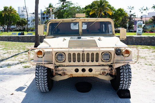 Miami, Florida, USA - May 22, 2025: Military truck HMMWV Humvee. Tactical vehicle HMMWV Humvee outdoor, side view. AM General HMMWV Humvee military vehicle