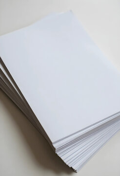Productivity and planning concept stack of blank white paper sheets for office communication creative writing business documentation and printing