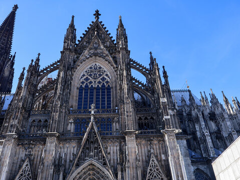 Ornate Gothic transept facade and stone portal of Cologne Cathedral on August 8 2026 in Cologne Germany  .
