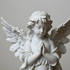 Fototapeta premium Spirituality and prayer concept, marble angel statue with folded hands in peaceful meditation for religious devotion and hope in a quiet sanctuary