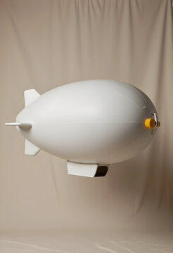 Advertising and brand promotion, white blimp airship model for aerial marketing and corporate branding campaigns on a neutral studio background