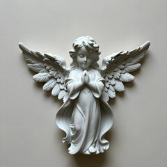 Fototapeta premium Spirituality and faith concept white marble angel statue with praying hands for religious peace hope and divine protection in a minimalist setting