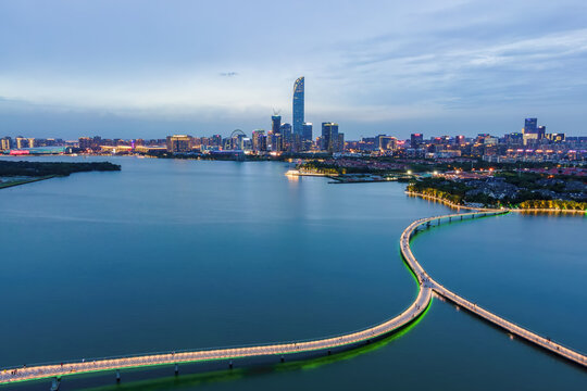 City Skyline View Over Lake At Dusk