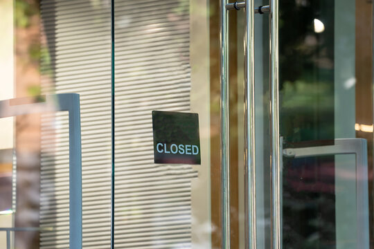 There is a closed sign on the door.