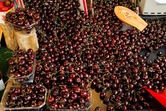 Fresh colorful cherries in a market in the Le Marais area of Paris