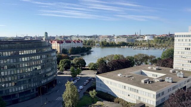 Rooftop View Over a City Bay and Autumn Trees in Helsinki