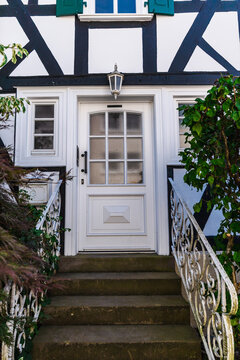 White-and-Blue Half-Timbered House Entrance in Freudenberg Germany
