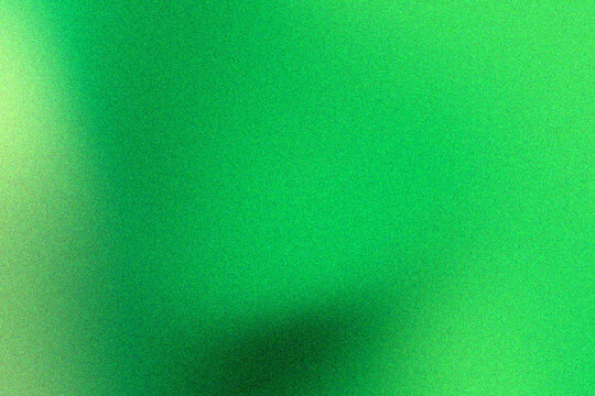 Abstract malachite green blur with grainy texture, soft colorful gradient, and diffuse atmospheric color for a modern decorative background design