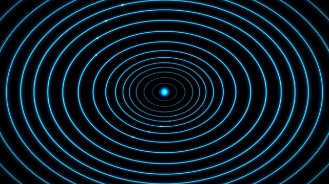 Concentric circles expand outward from a bright center on a black background