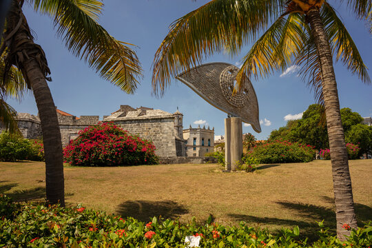 Havana's historic fortress in Cuba Castillo de la Real Fuerza or the surrounding area by La Punta fortress, decorated with a modern park sculpture in the form of a stylized eye or sail