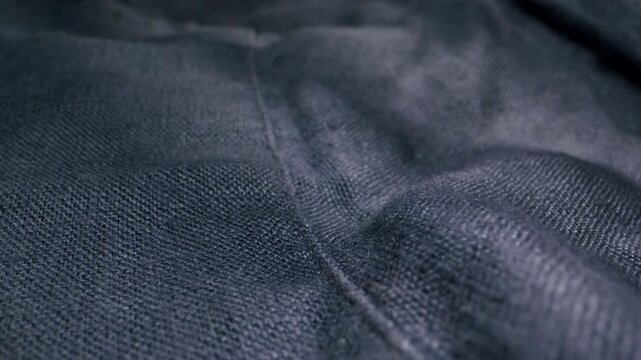 Macro texture of blue linen fabric, close-up of natural woven textile background