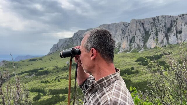 Mature Man Bushcrafting and Exploring Mountain Wilderness