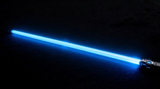 Blue Glowing Energy Sword Placed On Dark Background