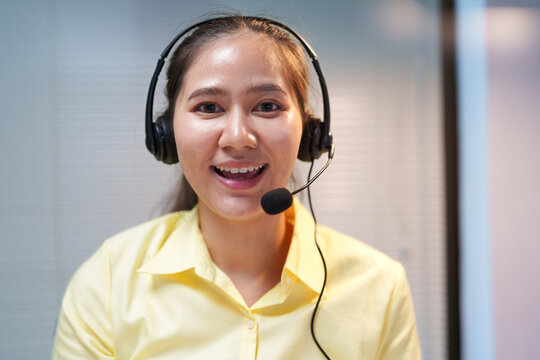 Smiling Customer Service Representative Wearing Headset
