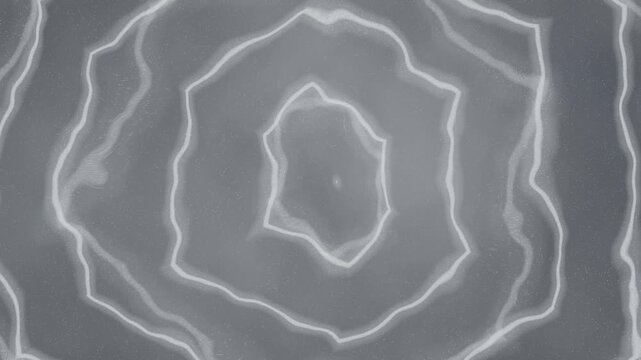 Abstract white hexagon tunnel morphing into organic ripples seamless loop