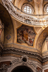 Baroque church interior with fresco, ornate architecture and decorative dome © Maral B