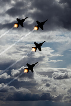 Air Force Day. Aircraft silhouettes on background of cloudy sky. Combat flight of interceptors on a mission. Vertical poster.
