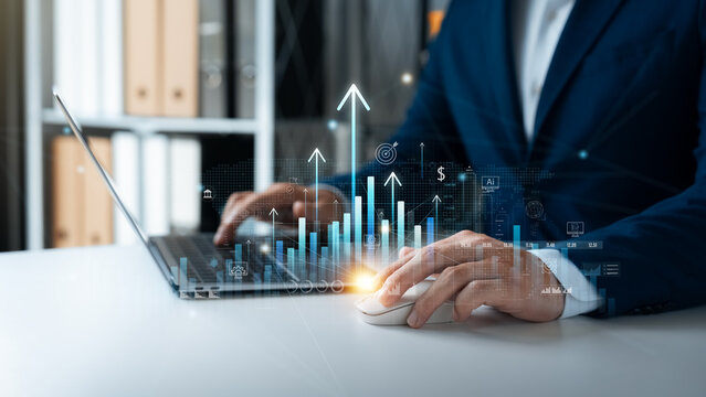 Corporate businessman analyzing financial data and business growth strategy using AI technology. Futuristic hologram charts showing upward trend for profit investment and corporate success.