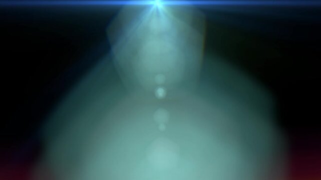 Cyan Teal Lens Flare and Soft Bokeh on Dark Background