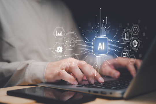 Business professional using laptop with AI digital interface and microchip, representing artificial intelligence, automation, machine learning, productivity, data analytics and digital transformation.