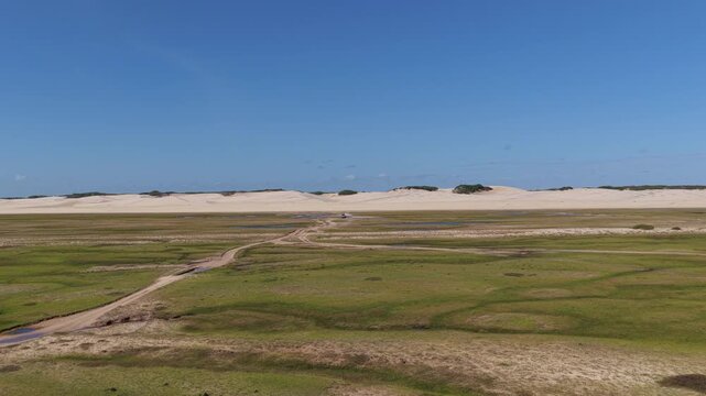 Aerial view of Lencois Maranhenses dunes and plains, Brazil.