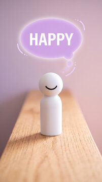 Happy smiling wooden figure with thought bubble on shelf