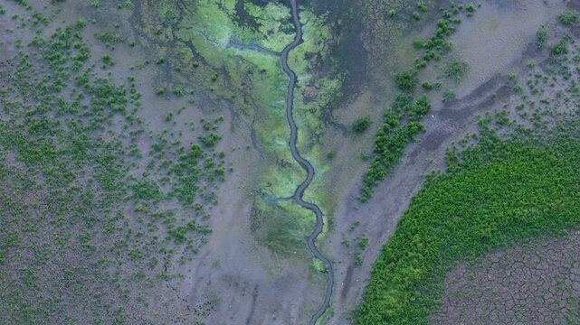 Aerial view showcasing extreme water depletion in the Varatic reservoir and riverbed area. Moldova