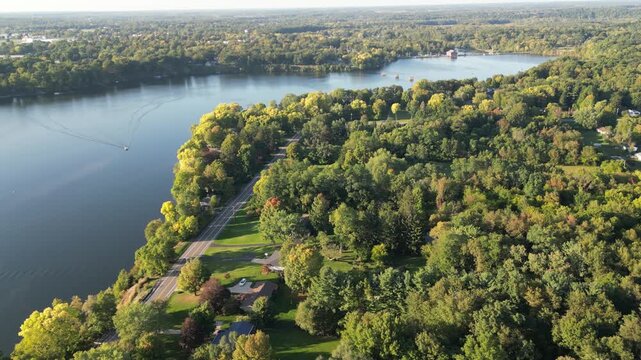 Aerial of Lake Chapin along the St. Joseph's River. Berrien Springs, Oronoko Charter Township, Michigan. Rural community with farms and lakeside home and vacation properties. Rangeline Road.