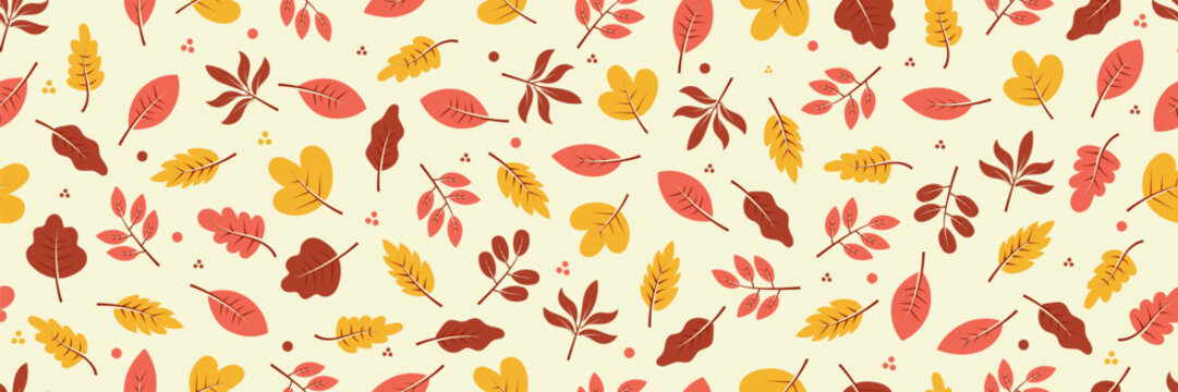 Seamless autumn leaf pattern with colorful foliage, branches and decorative dots in warm seasonal tones for backgrounds, textiles, wrapping, wallpaper and fall