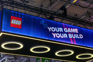 Fototapeta premium Cologne, Germany - August 26, 2026: LEGO branding displayed prominently at gamescom with the slogan 