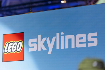 Fototapeta premium Cologne, Germany - August 26, 2026: LEGO Skylines display featuring the iconic logo at a major international gaming trade fair showcasing popular building sets and designs