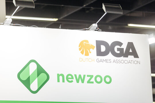 Cologne, Germany - August 26, 2026: Dutch Games Association and Newzoo logos displayed prominently at gamescom, showcasing branding in the gaming industry