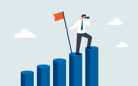 Businessman holding flag on top of growth chart looking