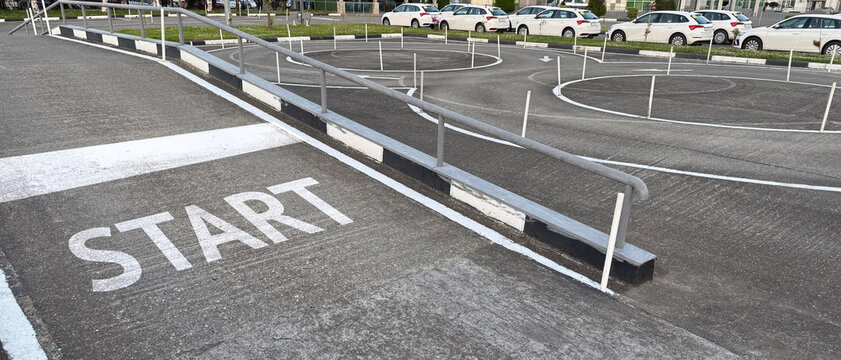 Practice vehicle school. Asphalt course field. Start line on ground of car driving test track.