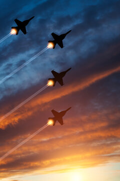 Air Force Day. Aircraft silhouettes on background of sunset. Combat flight of interceptors on a mission. Vertical poster.