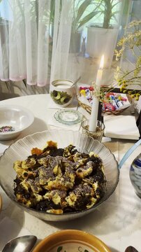 Traditional shulyk with poppy seeds and honey represents authentic Ukrainian cuisine and festive culinary heritage in Poltava region, Ukraine
