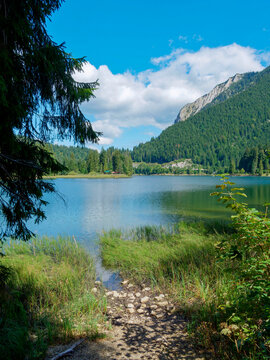 Lake Spitzingsee in Bavarian Alps. The trail through Firstgraben offers a view of the eastern shore at the foot of the slopes of J&auml;gerkamp and Wilde Fraulein.