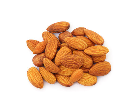 Heap of fresh almond nuts isolated on a white background.