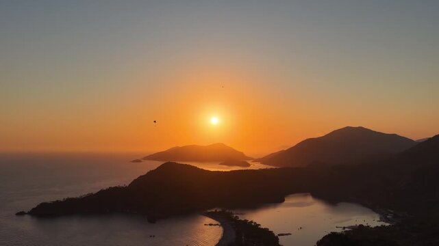 Fethiye Oludeniz Paragliding Drone Video, Fethiye Paragliding in the Sunset Time Drone Video, Kumburnu Beach Oludeniz, Fethiye Mugla, Turkiye (Turkey)