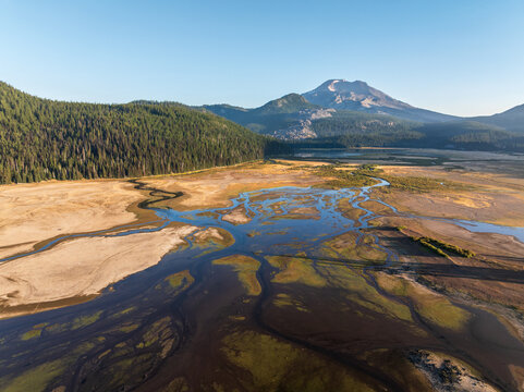 An aerial drone view showcasing the scenic landscape of Ray Atkeson Memorial Trail and Sparks Lake in Deschutes County Oregon near South Sister.