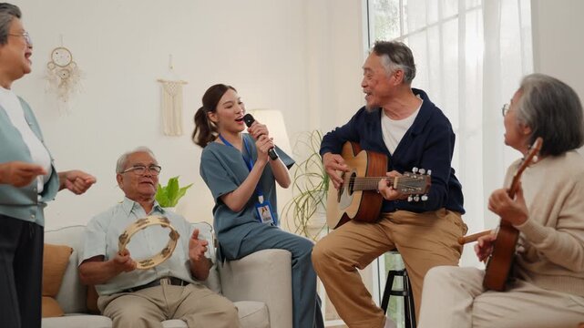 Senior retirement lifestyle elderly people enjoy music therapy with caregiver support, guitar and tambourine in bright home care living room, senior group music activity in warm room