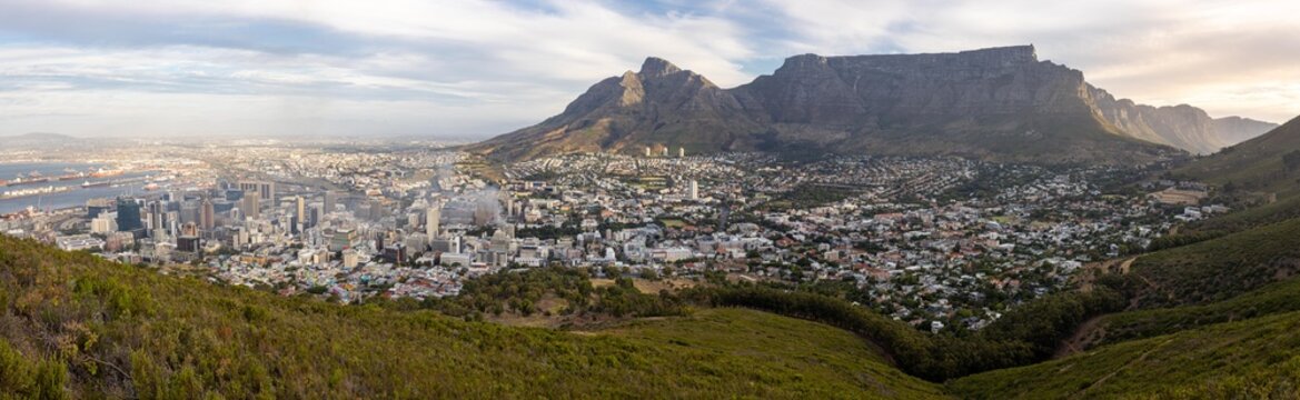 View of Table Mountain overlooking the cityscape and harbor of Cape Town, South Africa.