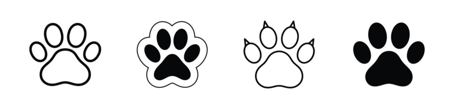 A comprehensive collection of black and white paw prints representing various animal footprints for design